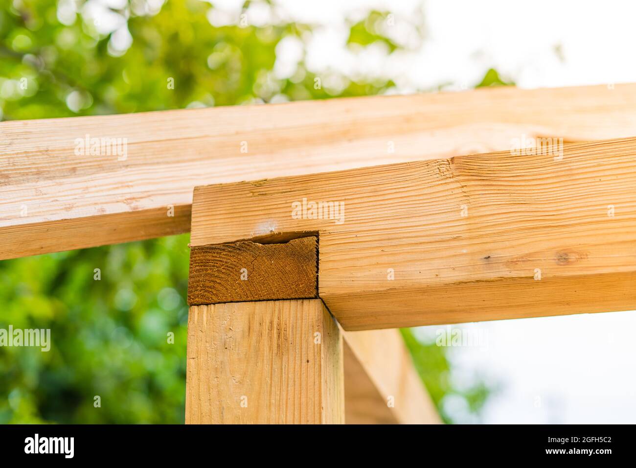 Corner connection of timber beams. Wooden frame made of large beams Stock Photo Alamy