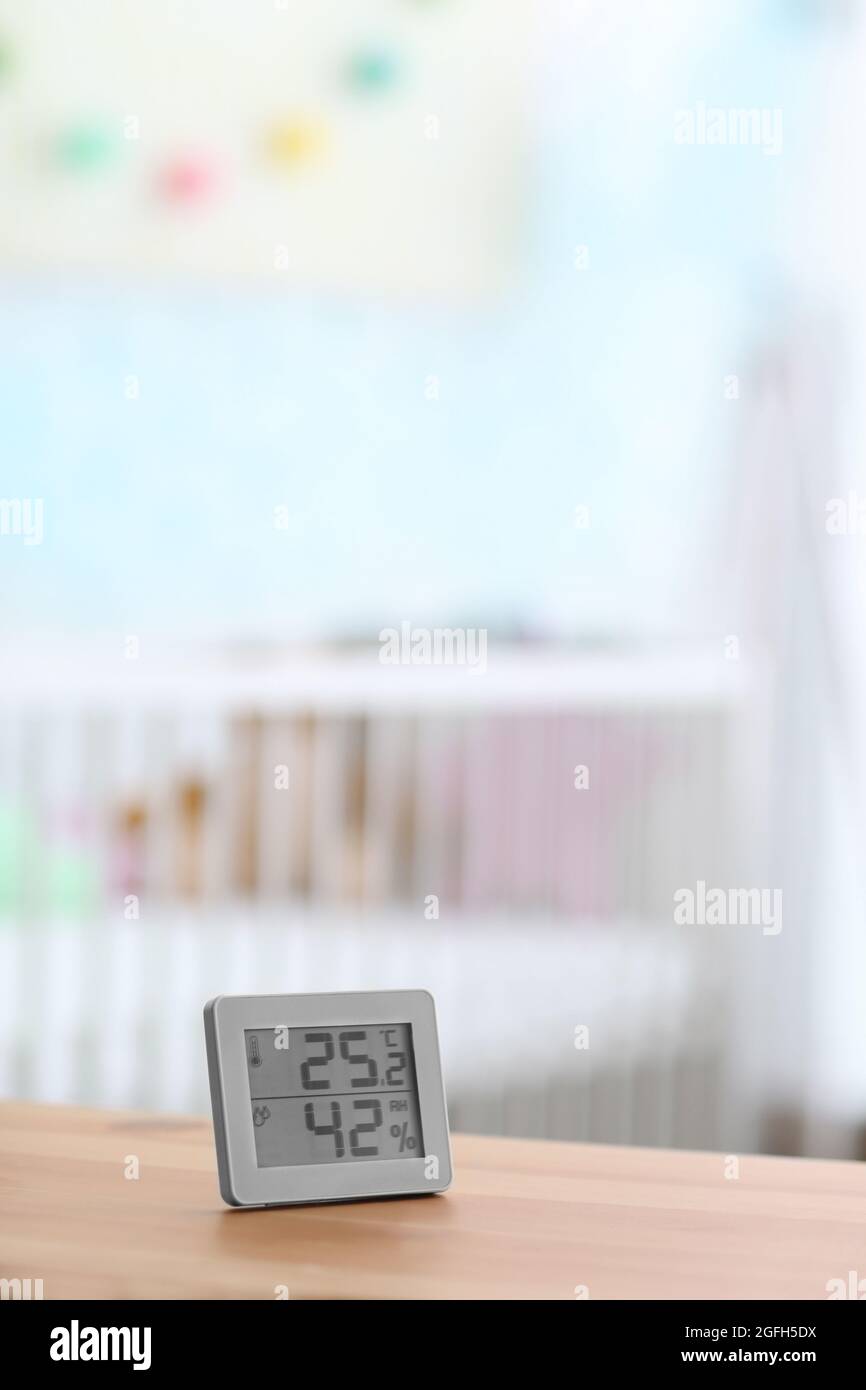 Digital temperature and humidity control in baby room Stock Photo Alamy