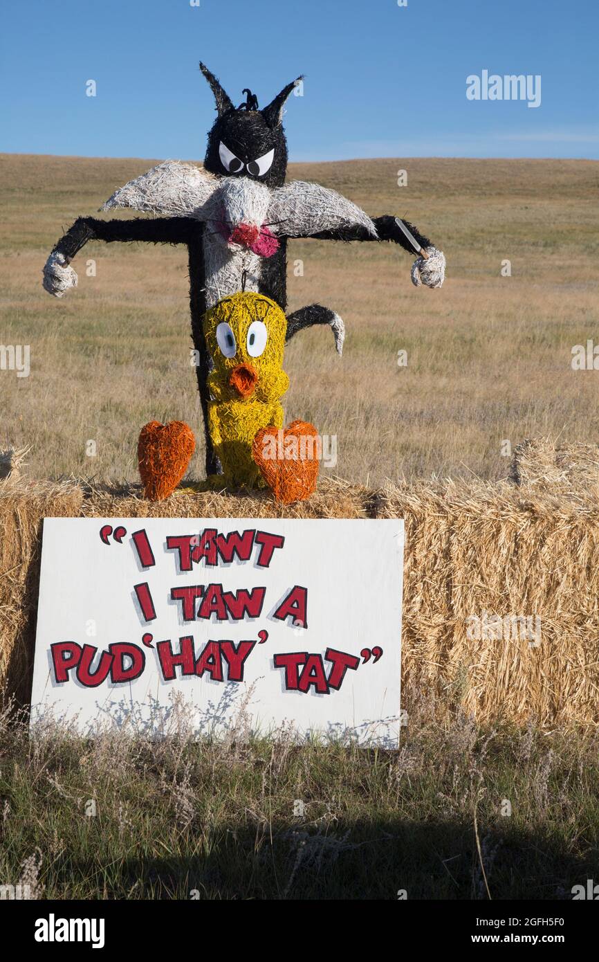 Montana Bale Trail celebrates cartoon characters Tweety and Sylvester with a creation titled 'Straw-Vester & Tweet-Hay.' Stock Photo