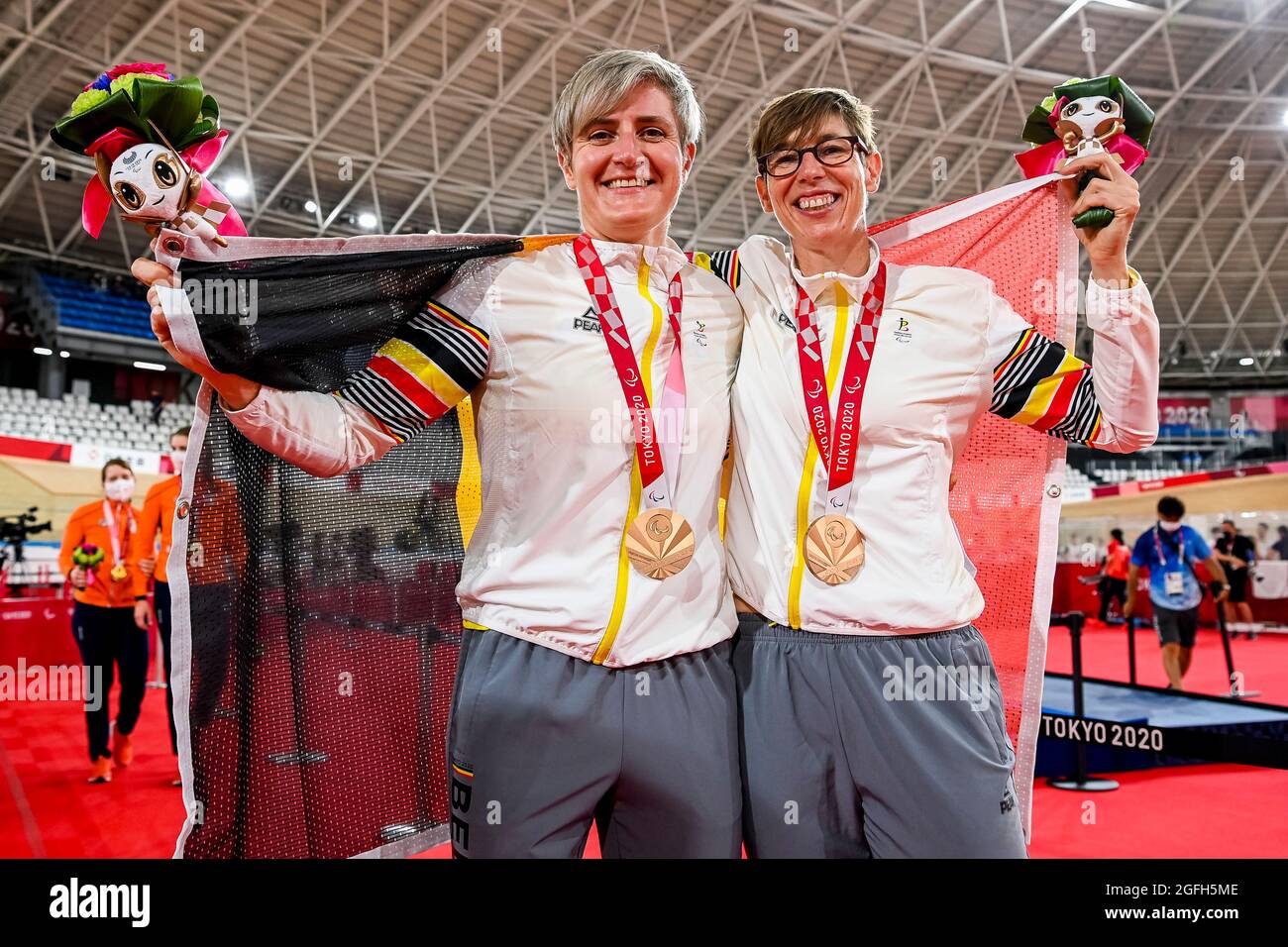 Anneleen Monsieur And Paralympic Cyclist Griet Hoet Pose For The ...