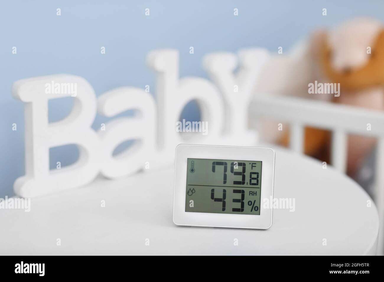 Digital temperature and humidity control in baby room Stock Photo Alamy