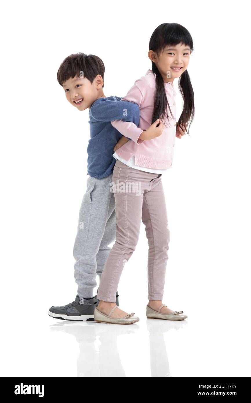 Happy children playing together Stock Photo - Alamy