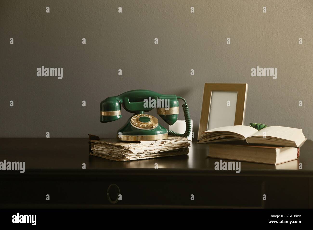 Old telephone on the table in room Stock Photo Alamy