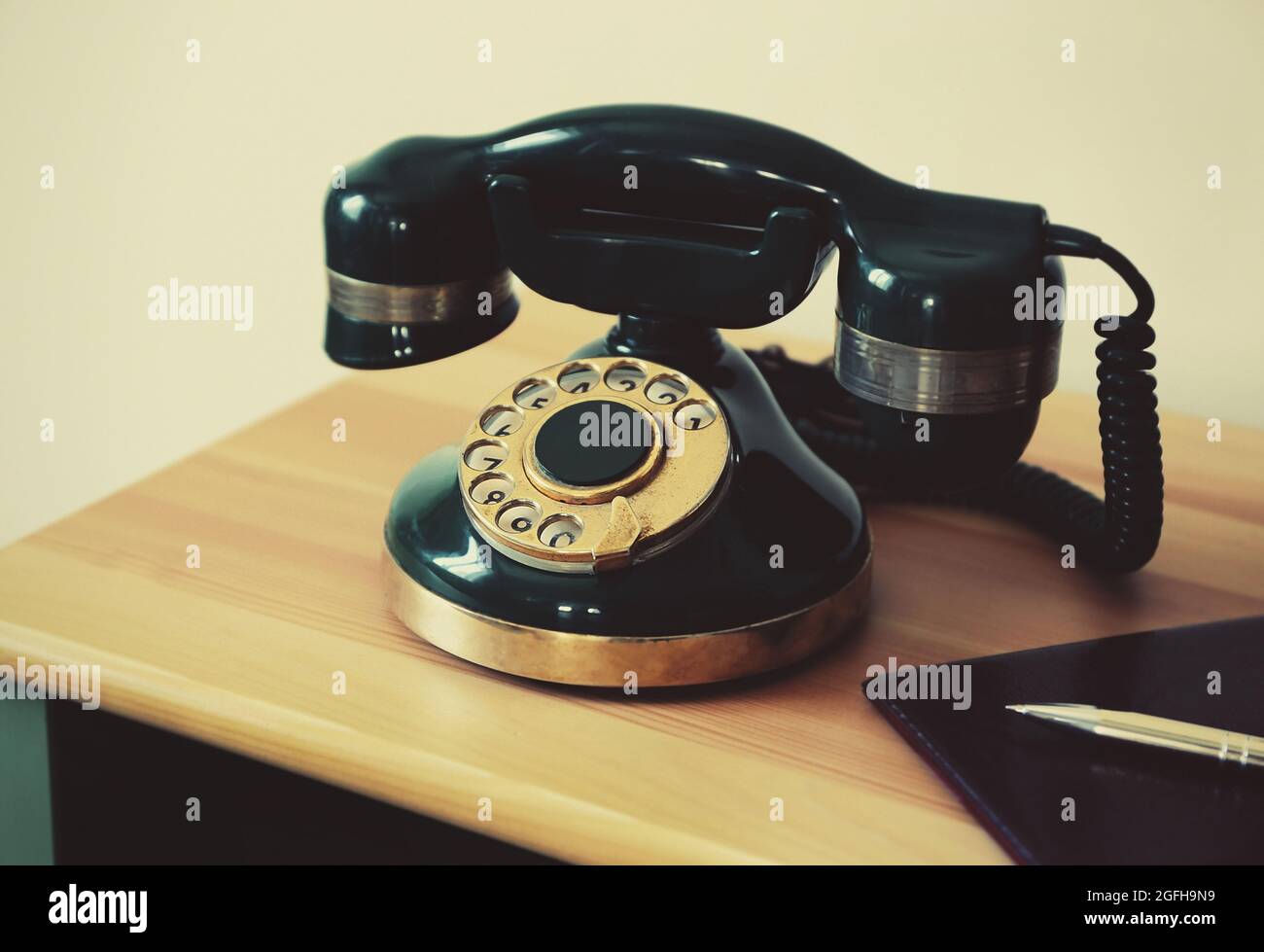 Old telephone on table, closeup Stock Photo Alamy