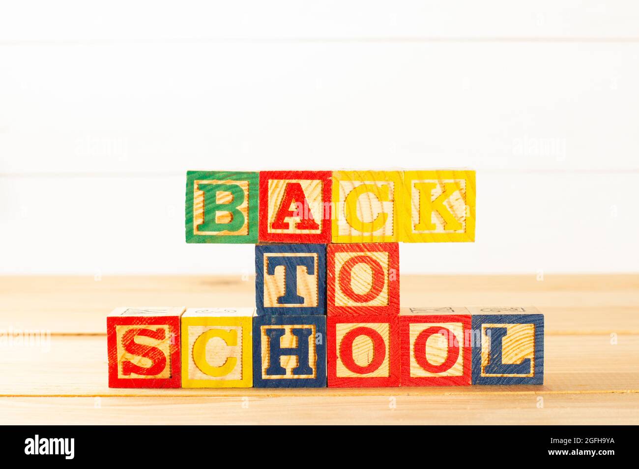 Spectacular representation of back to school with wooden cubes on a ...