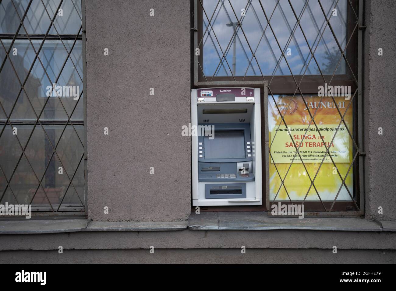 Riga, Latvia. 22 August 2021.  an ATM machine on a city center street Stock Photo