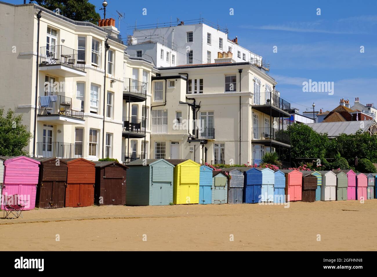Colourful beach huts (bathing boxes) and white buildings at Viking Bay