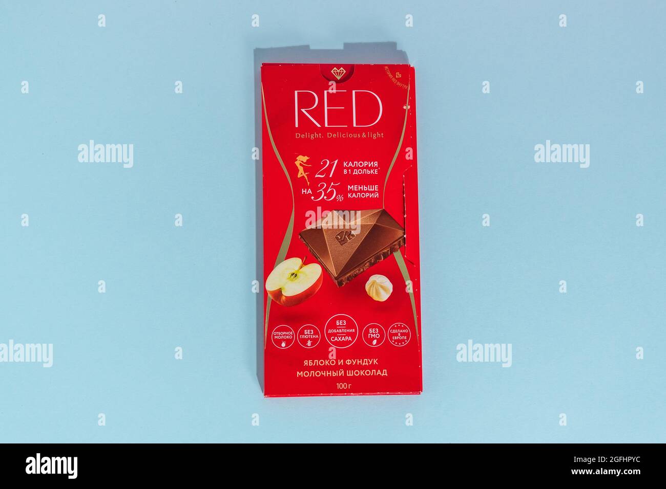 Tyumen, Russia-August 06, 2021: Red milk chocolate with hazelnuts and ...