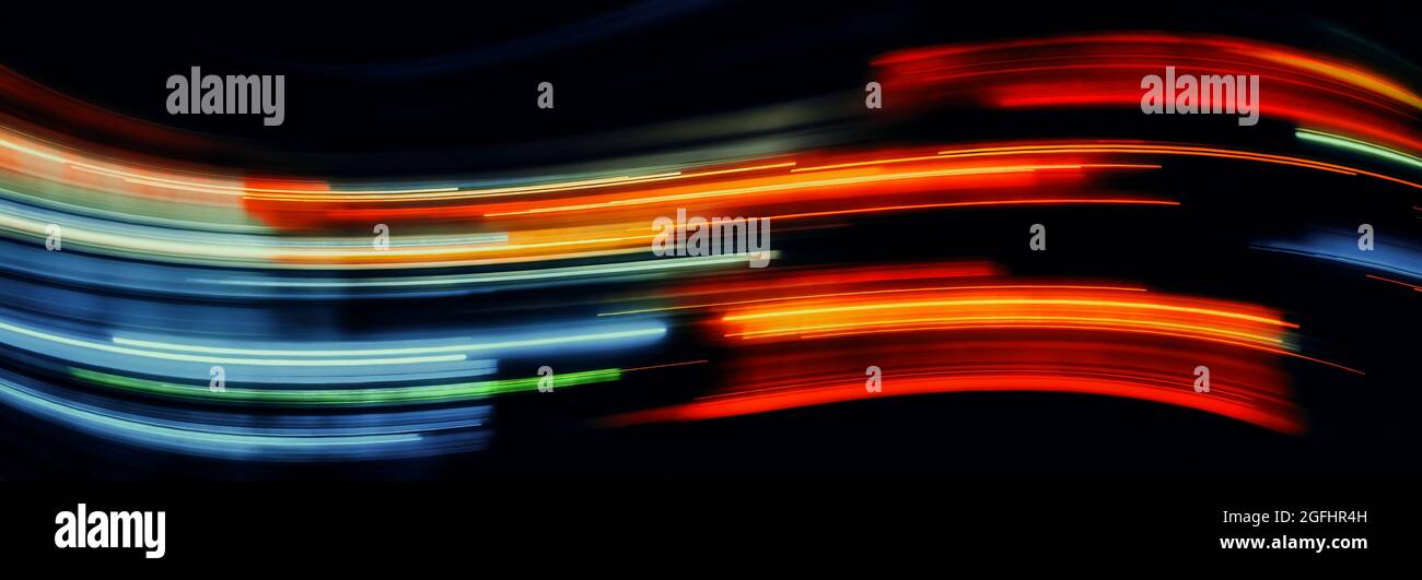 Abstract Rainbow waves light trails on the dark background Stock Photo ...