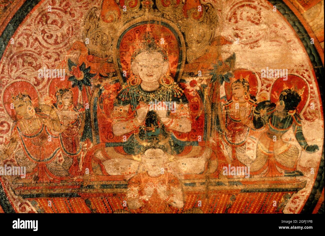 Nepal: Chandra Mandala circa .1425 A.D. Chandra, 2 Consorts and Charioteer. On Cotton. Stock Photo