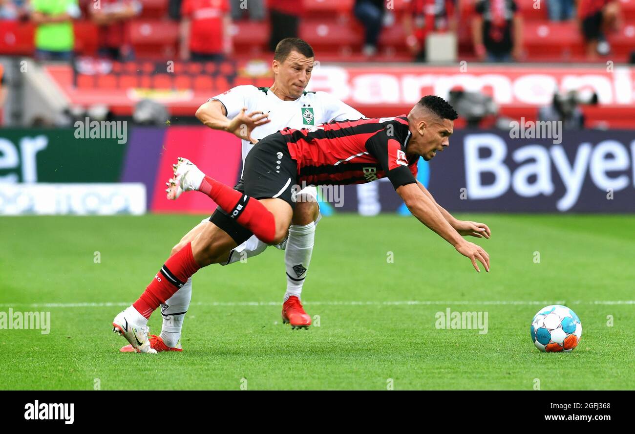 BayArena Leverkusen, Bayer Leverkusen vs Bor. Moenchengladbach; Stefan Lainer, Paulinho. Stock Photo