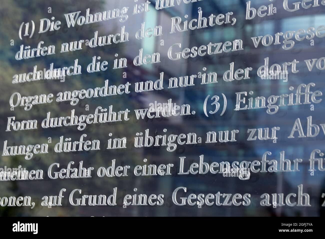 German Basic Law Article 13,Inviolability of the home (Unverletzlichkeit der Wohnung) , photographed on the glass panes at Jakob-Kaiser-Haus in Berlin Stock Photo