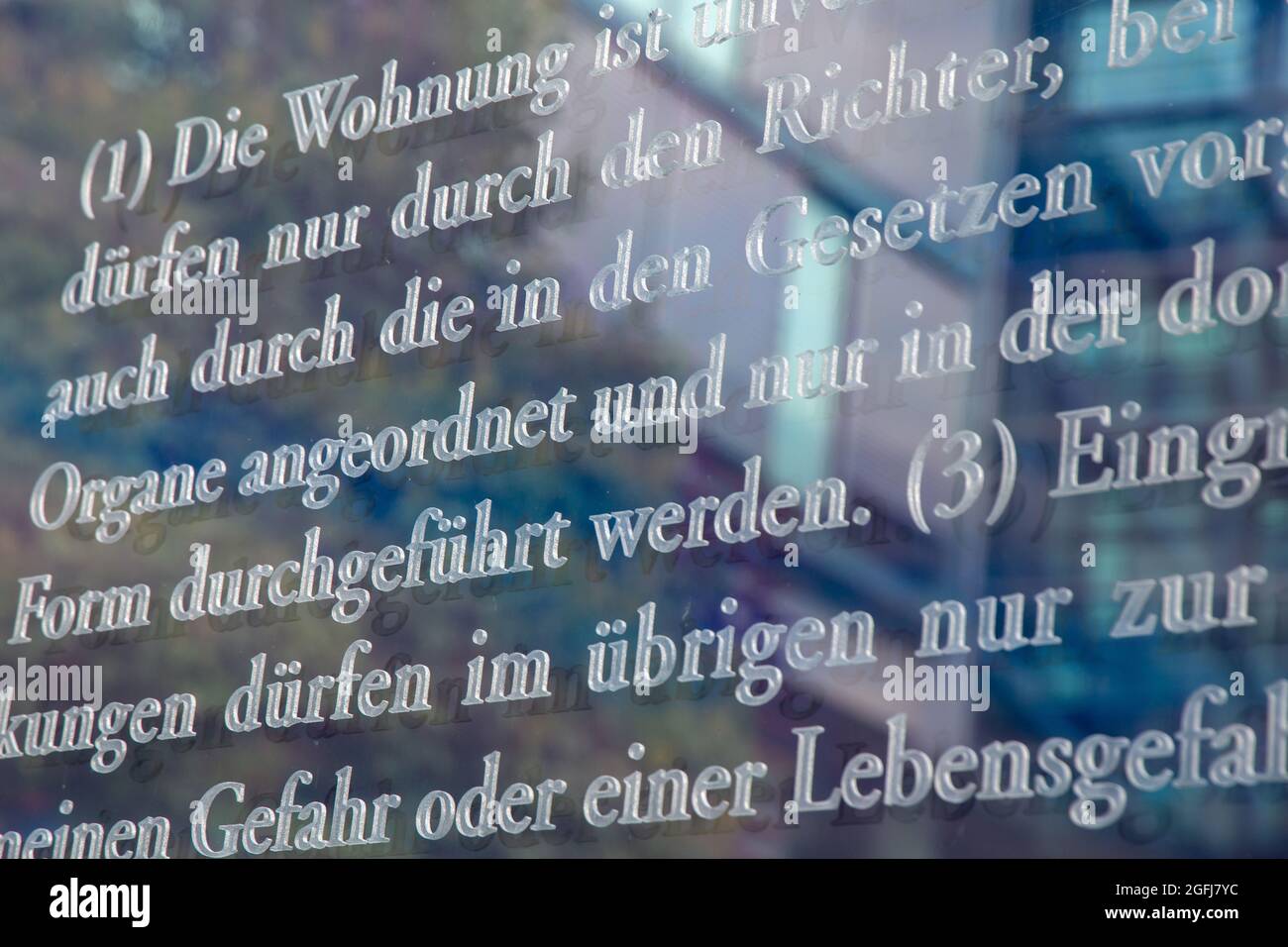 German Basic Law Article 13,Inviolability of the home (Unverletzlichkeit der Wohnung) , photographed on the glass panes at Jakob-Kaiser-Haus in Berlin Stock Photo