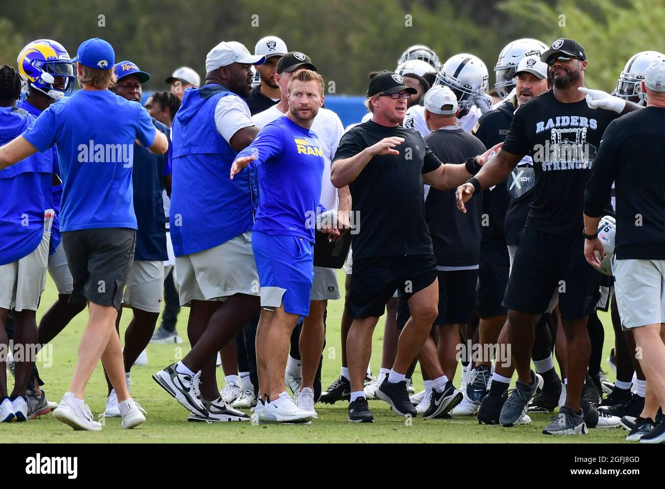 Rams head coach Sean McVay (left) and Raiders head coach Jon Gruden (right) attempt to break up a fight that broke out between the Los Angeles Rams an Stock Photo