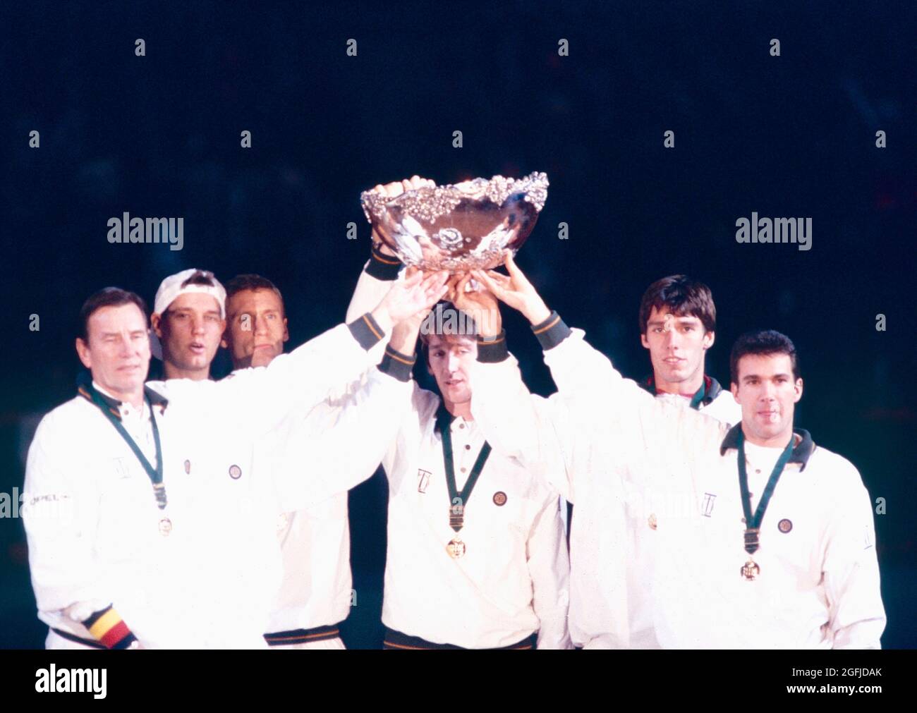 German tennis team celebrating victory with the trophies, Davis Cup