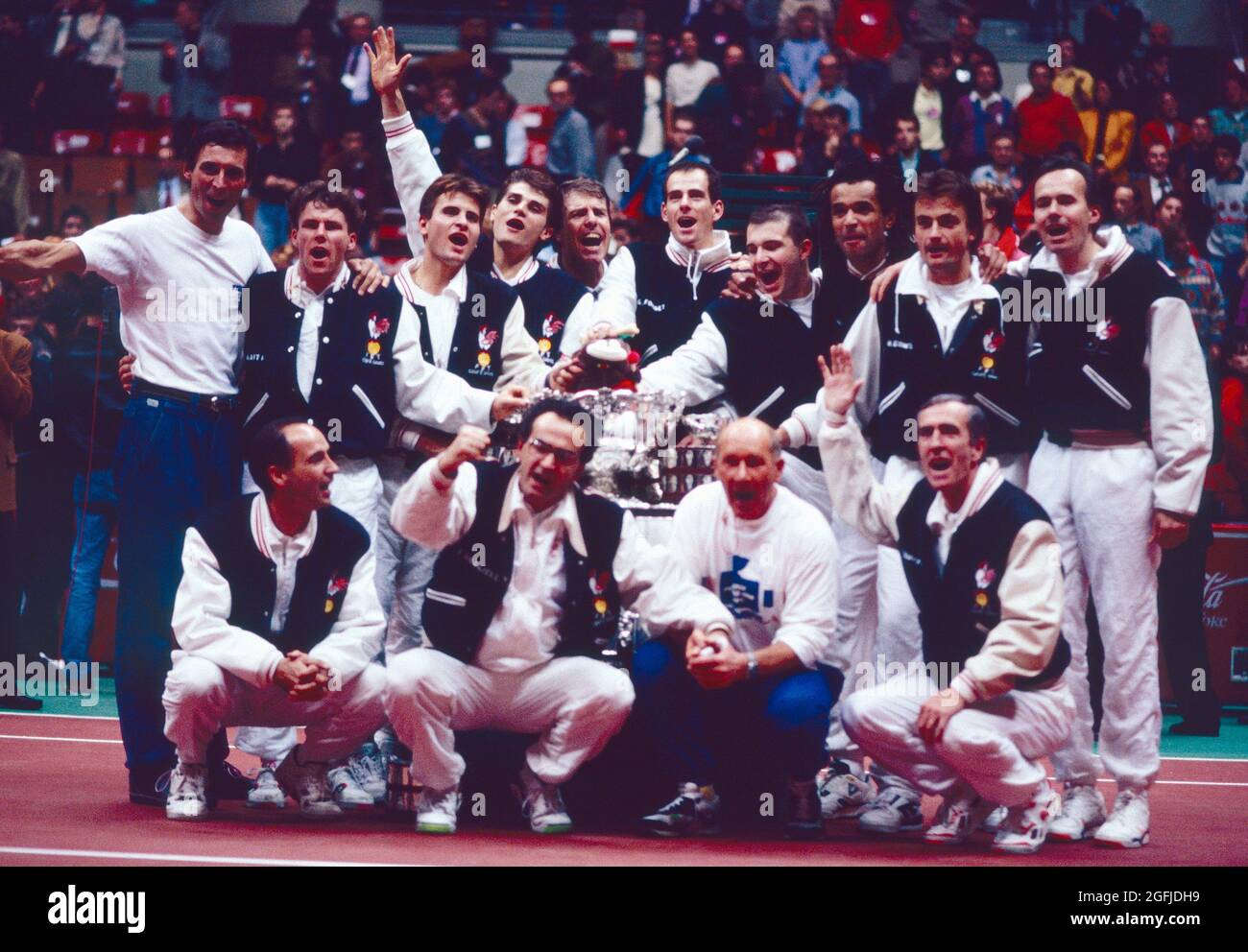 French tennis players and supporting team celebrating victory over the US  team, Davis Cup tournament, Lyon 1991 Stock Photo - Alamy