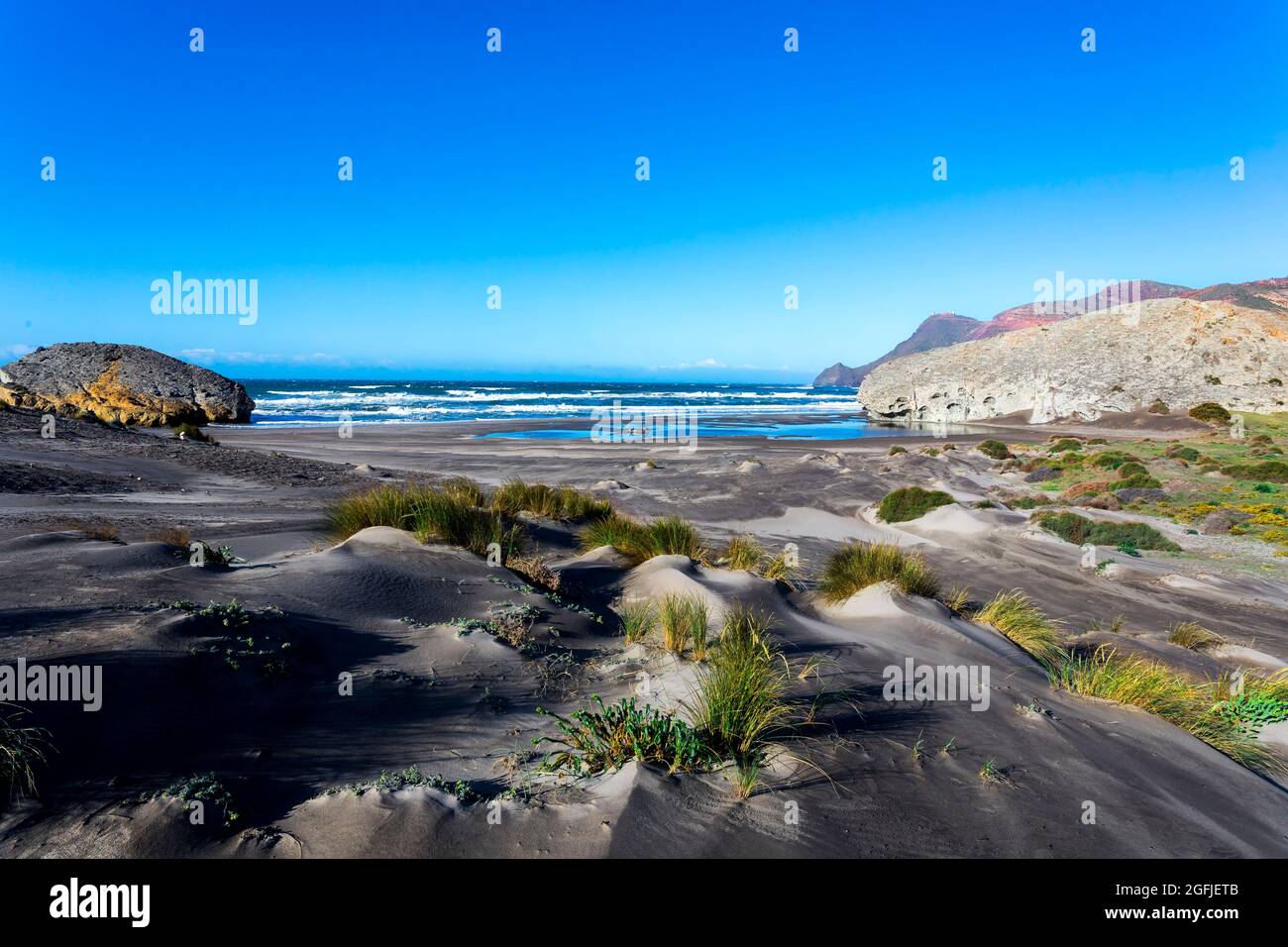 Landscape of the coastal area Cabo de Gata, province of Almeria, Andalucia, Spain. Beach Playa de Monsul along the Mediterranean coast, Cabo de Gata N Stock Photo