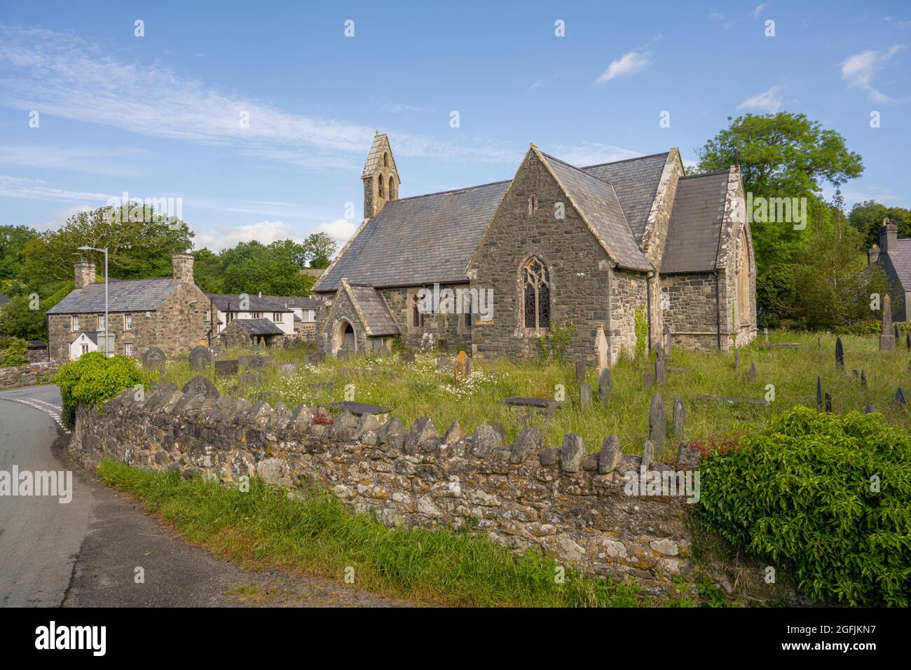Church yard of the village church Llanystumdwy Gwynedd North Wales. Stock Photo