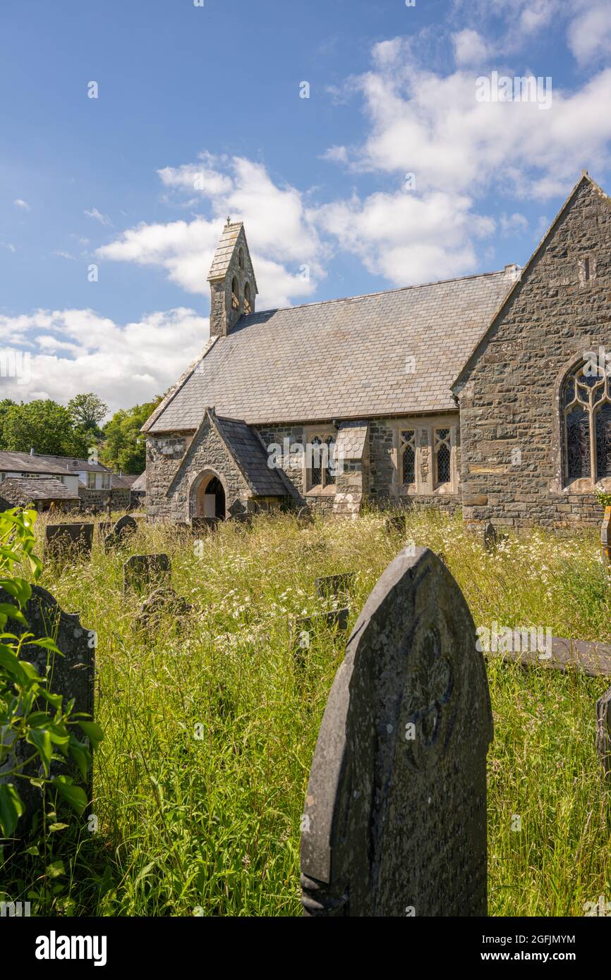 St John’s Church yard of the village church Llanystumdwy Gwynedd North Wales. Stock Photo