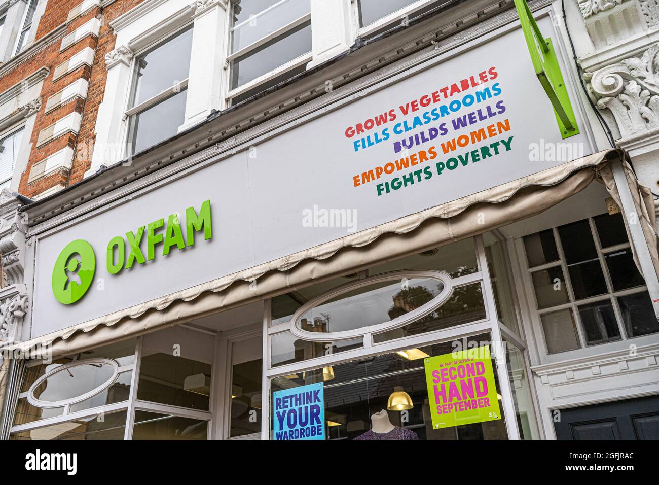 Oxfam charity shop signage in Wimbledon High Street Stock Photo - Alamy