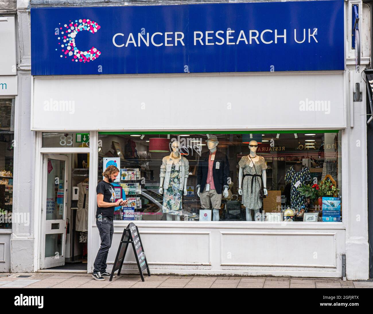 Cancer Research charity shop exterior in Wimbledon High Street Stock