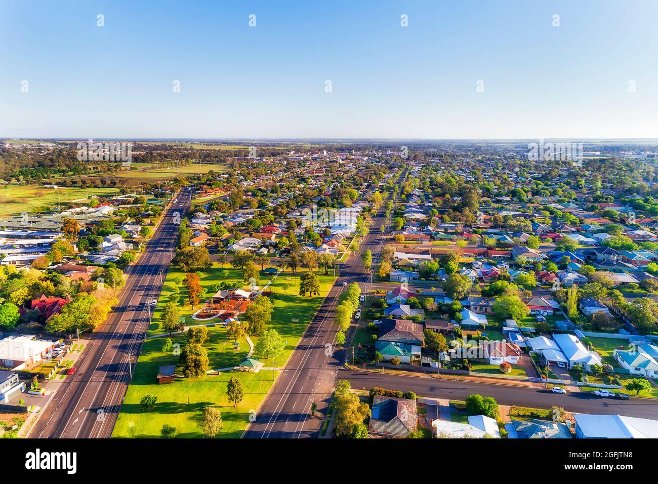 Flat Great Western plains in Australia - aerial view over regional rural town Dubbo. Stock Photo