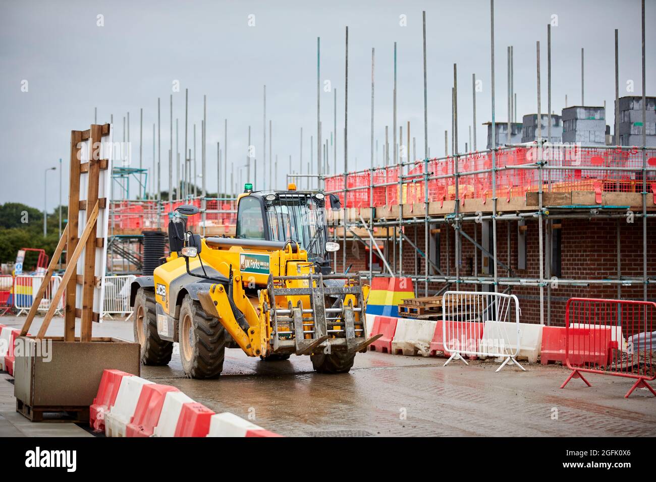 JCB TELEHANDLERS on a building site of new houses Stock Photo