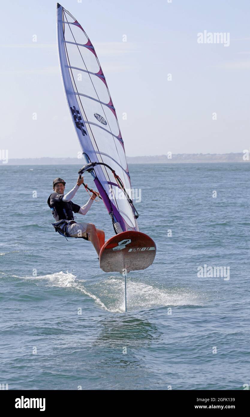 Foiling Windsurfer, Solent Stock Photo