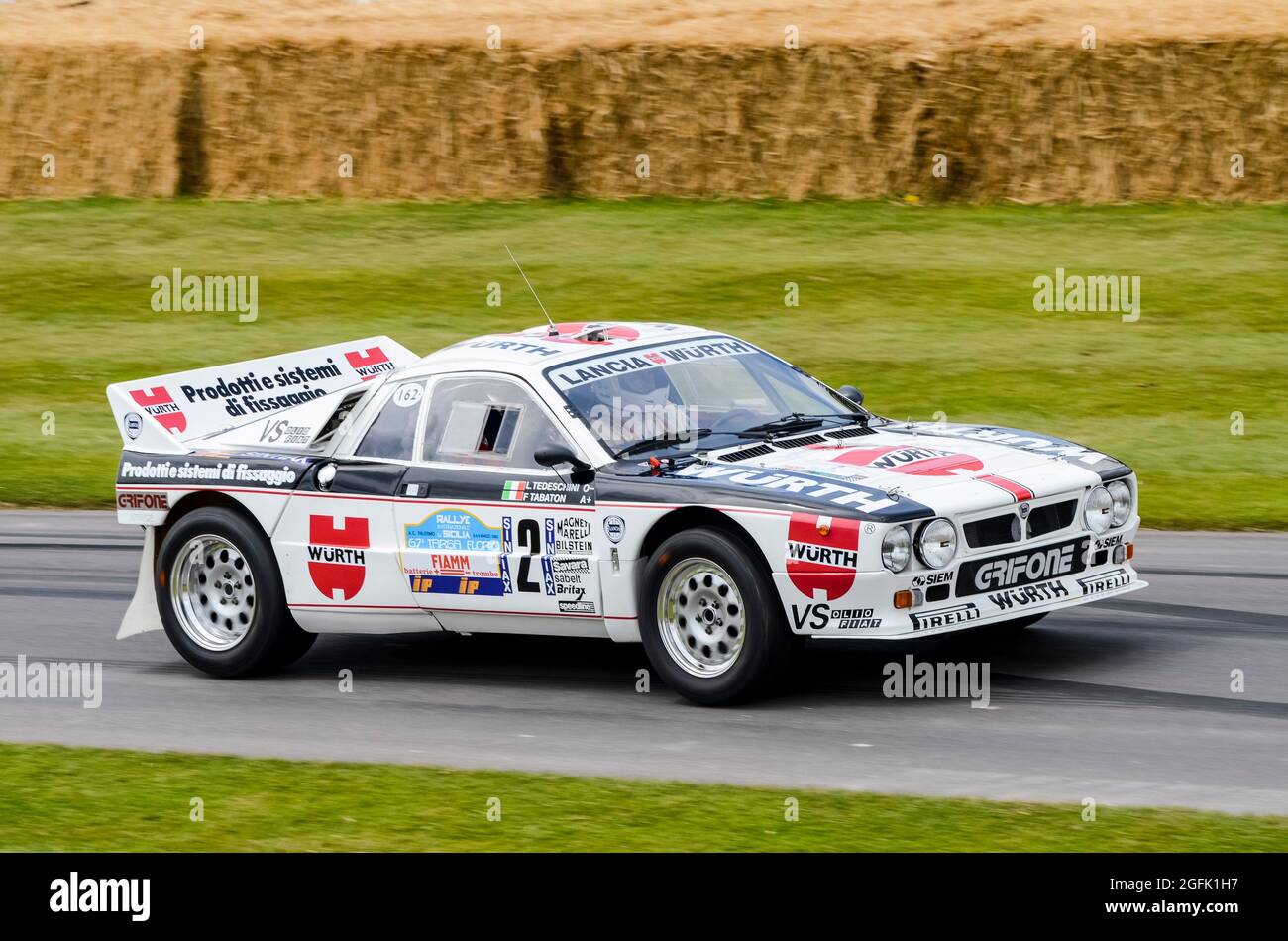 Lancia Rally 037 Group B rally car racing up the hill climb at the Goodwood Festival of Speed 2014. Motor racing event. Stock Photo