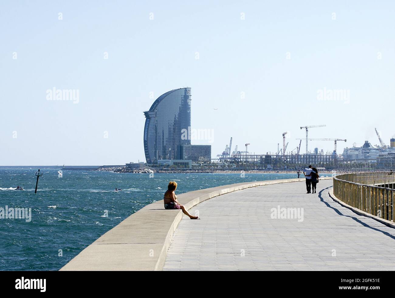 Barcelona breakwater promenade with modern building in the background, Catalunya, Spain, Europe Stock Photo