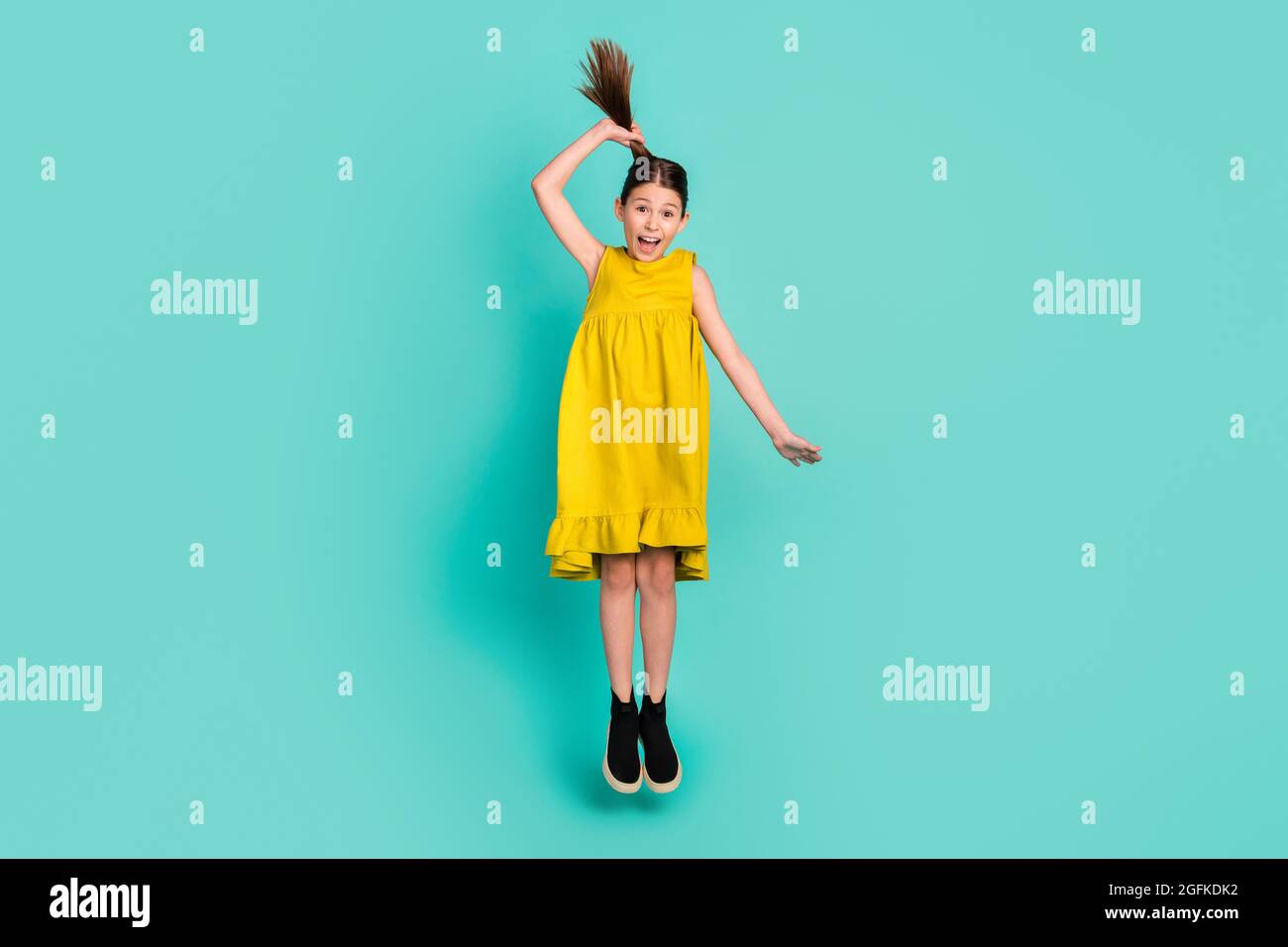 Full Size Photo Of Optimistic Nice Brown Hair Girl Jump Wear Yellow Dress Isolated On Bright 9966