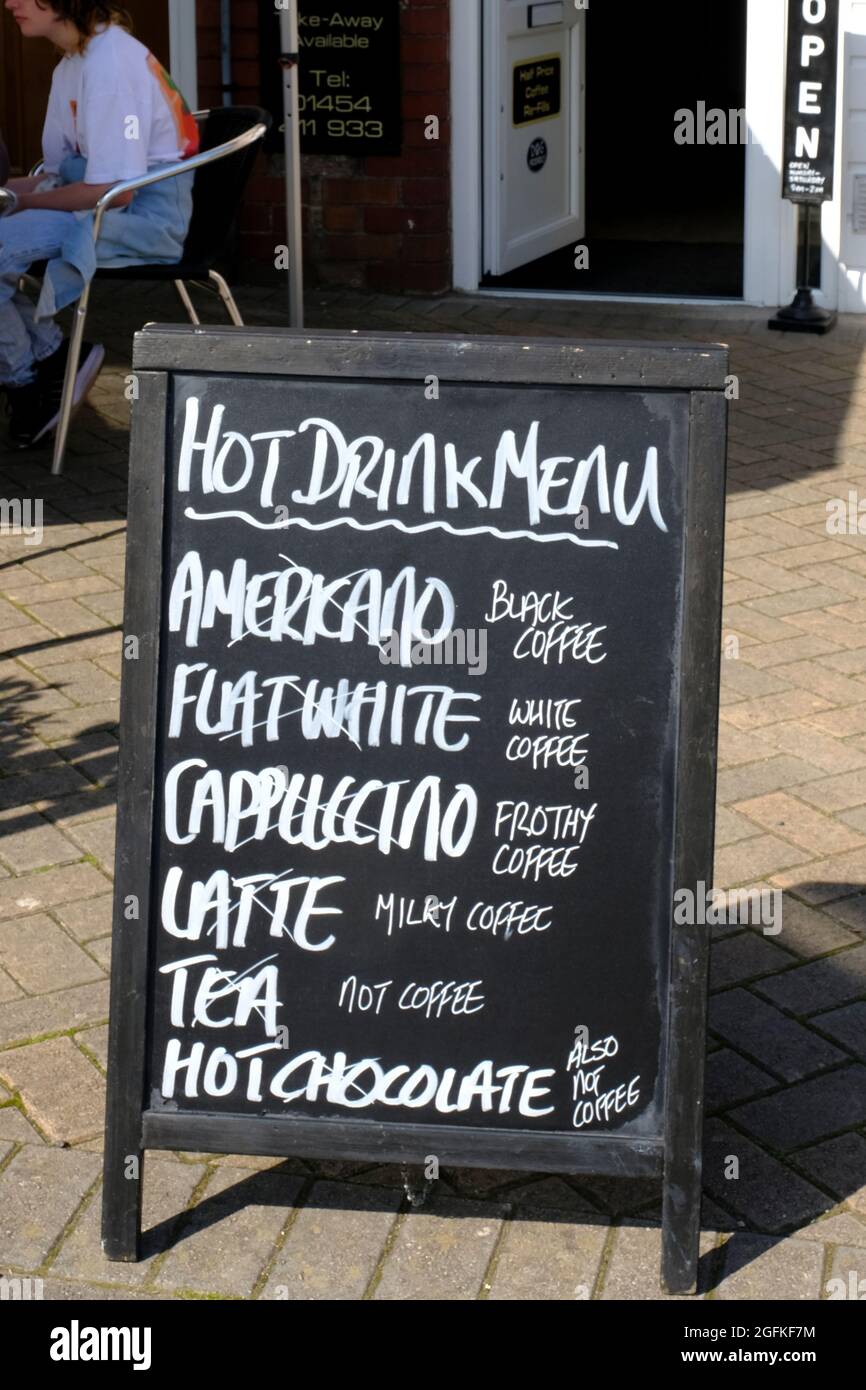 Thornbury, Glos, UK. 26th Aug, 2021. Café A-board translates modern Coffee names to those that would be familiar a short while ago. Shelly's is an independent Café popular with locals for good food and a friendly welcome. Credit: JMF News/Alamy Live News Stock Photo