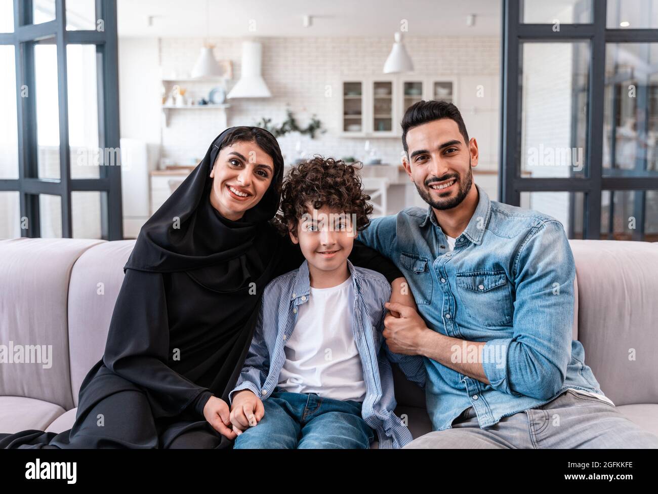 happy family spending time together. Arabian parents and kid lifestyle ...