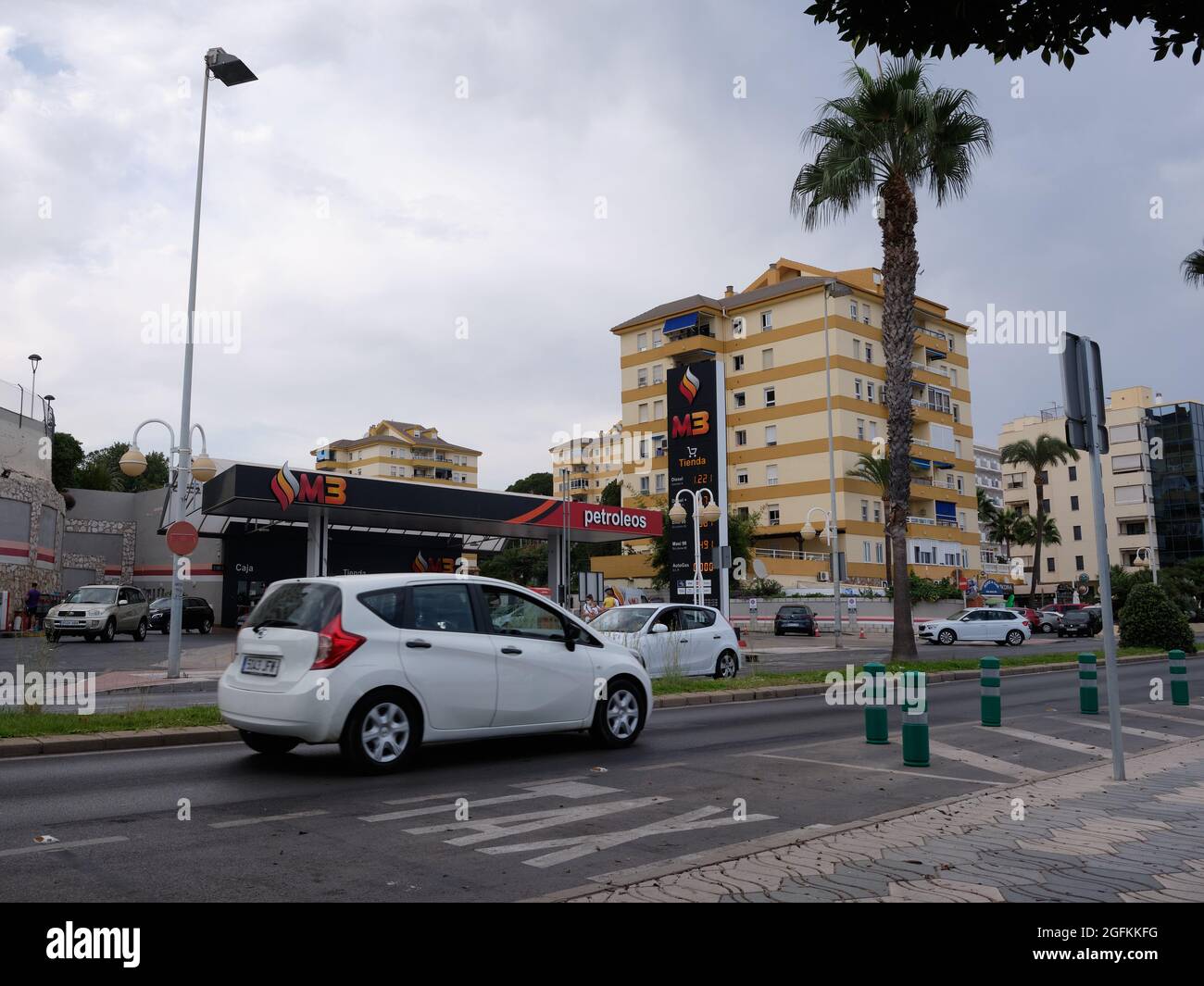 Cars passing MB Petroleros gas station in Benalmadena Costa, Malaga