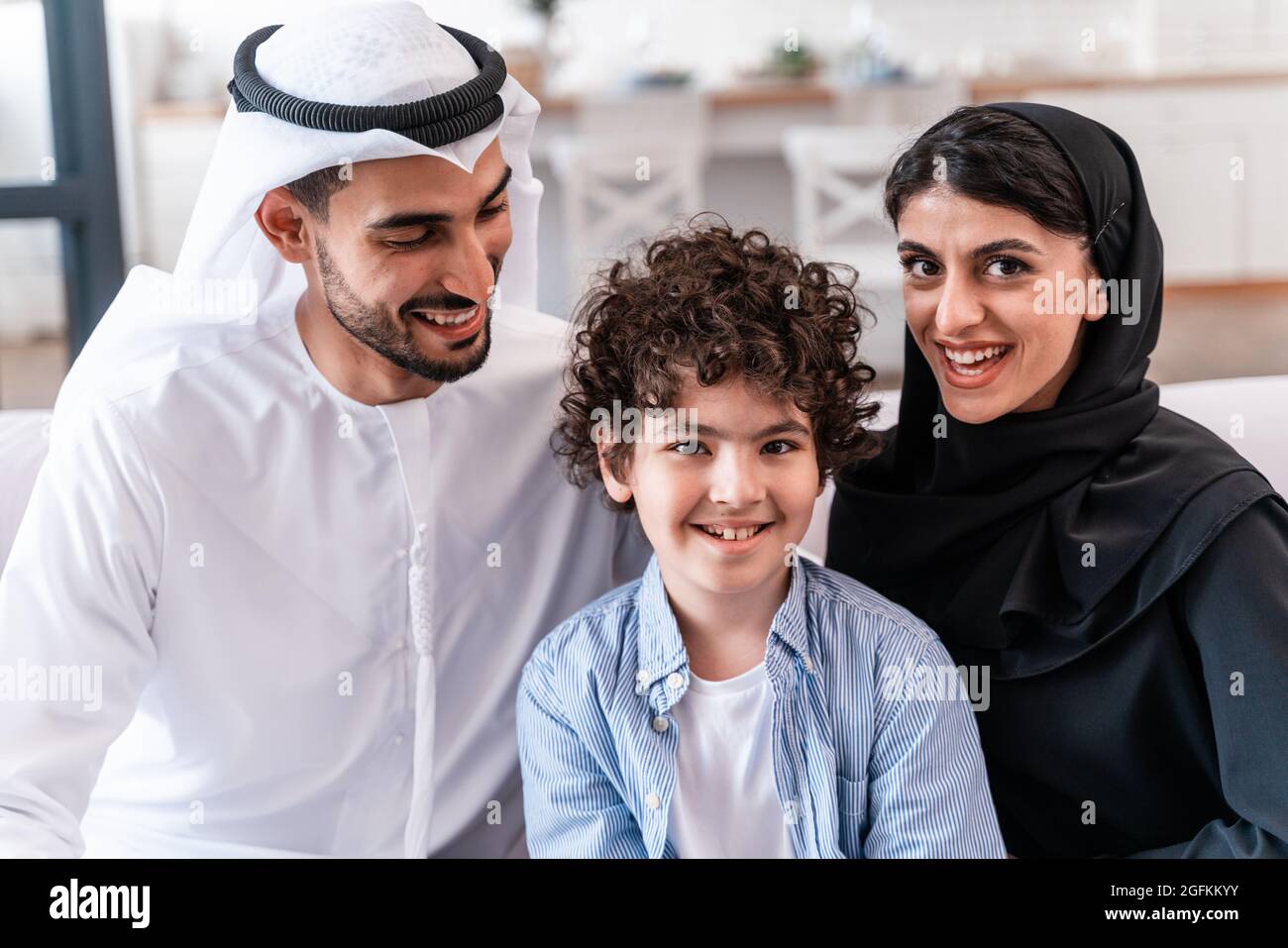 happy family spending time together. Arabian parents and kid lifestyle ...