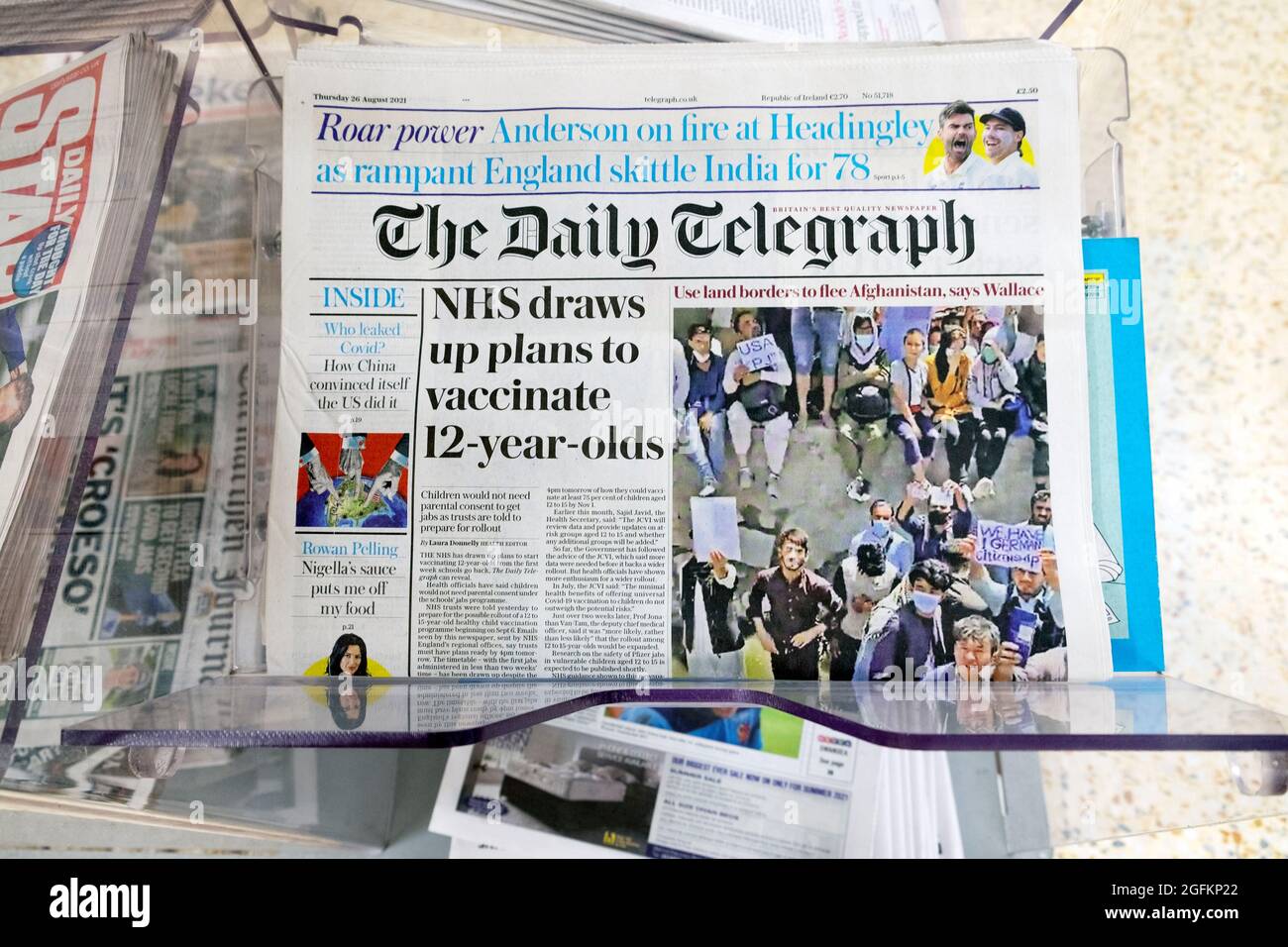 Daily Telegraph front page Covid 19 coronavirus pandemic newspaper headline 'NHS draws up plans to vaccinate 12-year-olds' 26 August 2021  London UK Stock Photo
