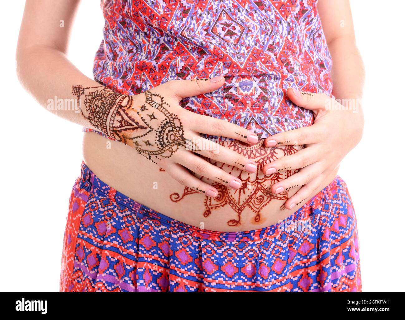 Henna tattoo on pregnant belly on white background Stock Photo - Alamy