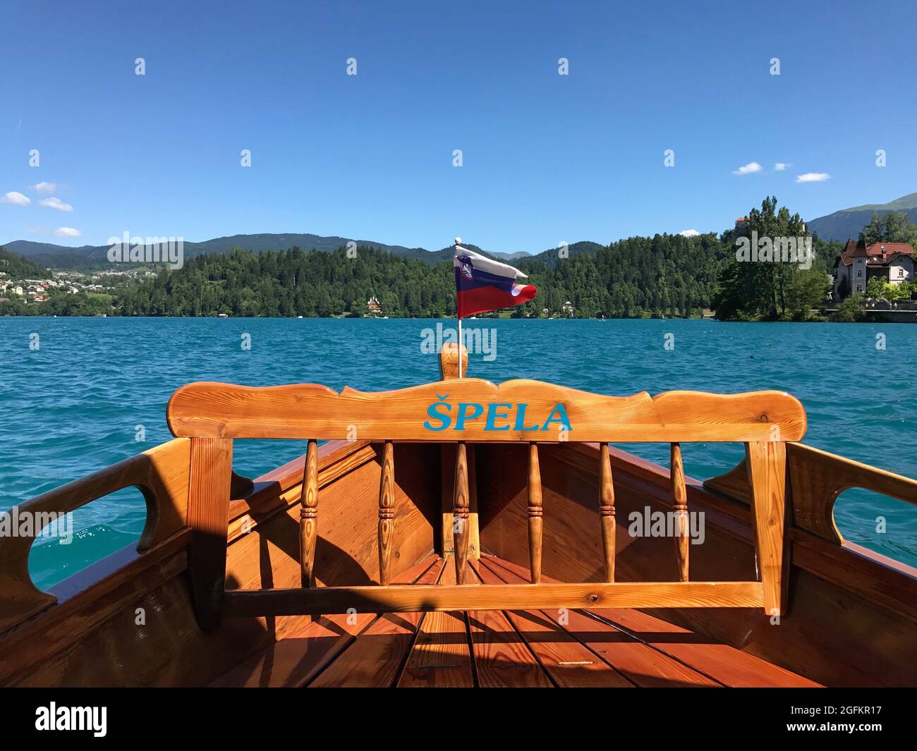Typical tourist Boat at Lake Bled with Slovenian Flag Stock Photo