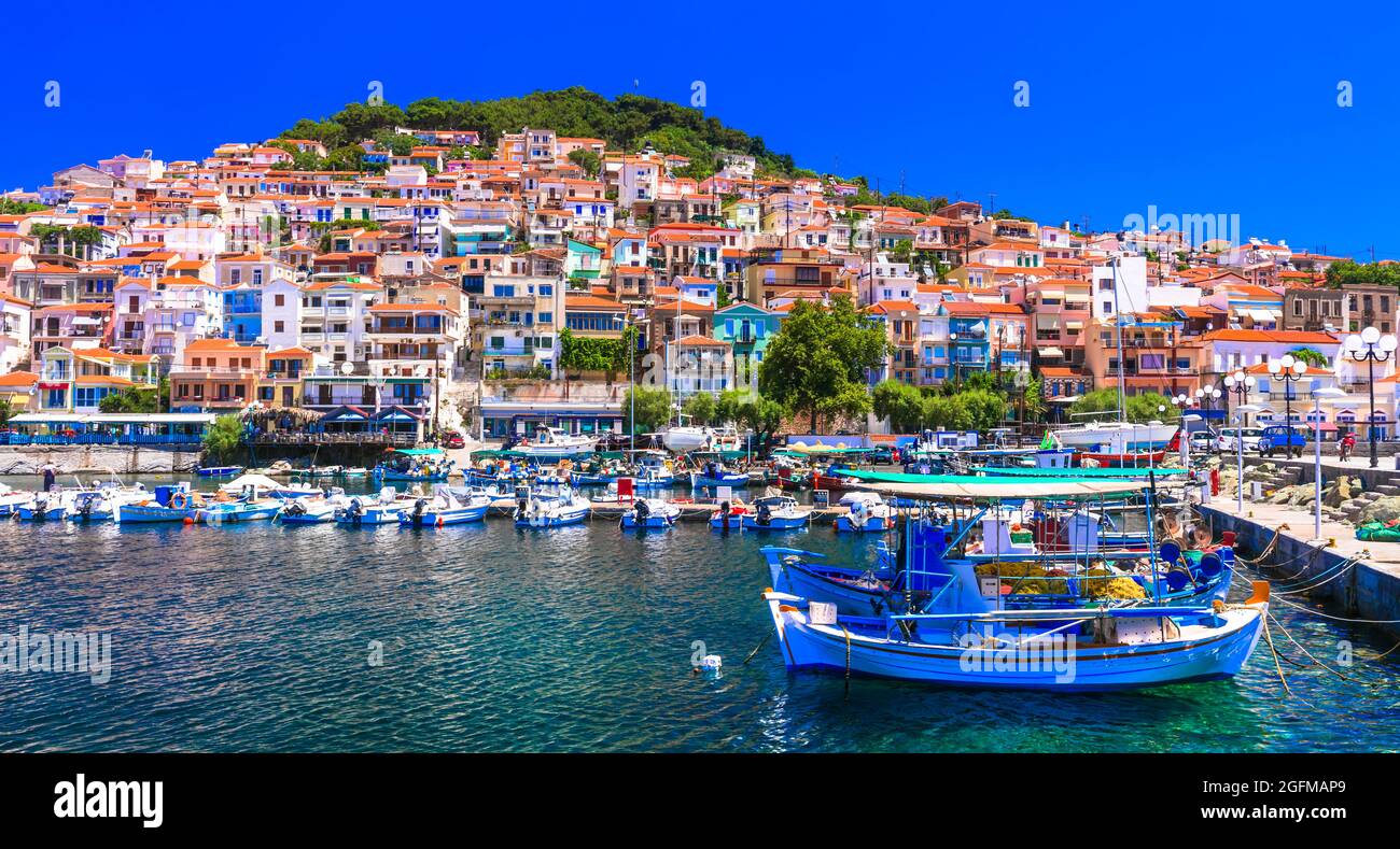 Traditional colorful Greece  - charming Plomaripn town. Fishing boats in the port, Lesvos island, Eastern Sporades Stock Photo