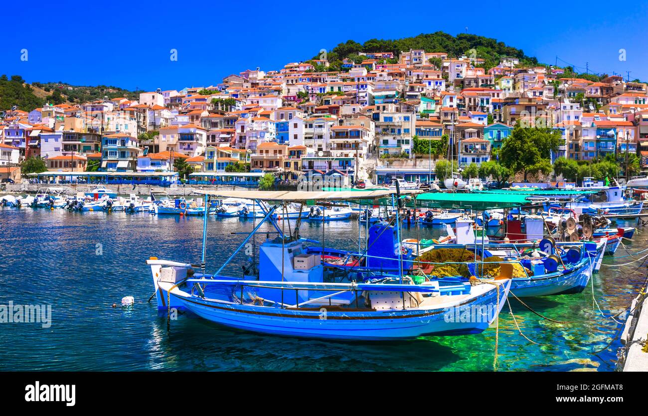 Traditional colorful Greece  - charming Plomari town. Fishing boats in the port, Lesvos island, Eastern Sporades Stock Photo