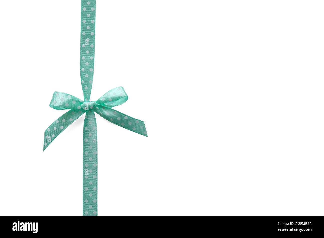 Beautiful green ribbon with bow on white background Stock Photo - Alamy