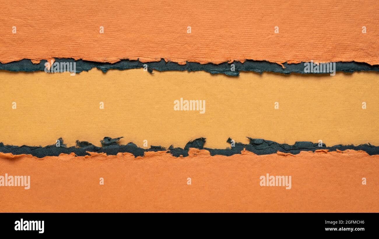 paper abstract in orange and black with a copy space - sheets of ...