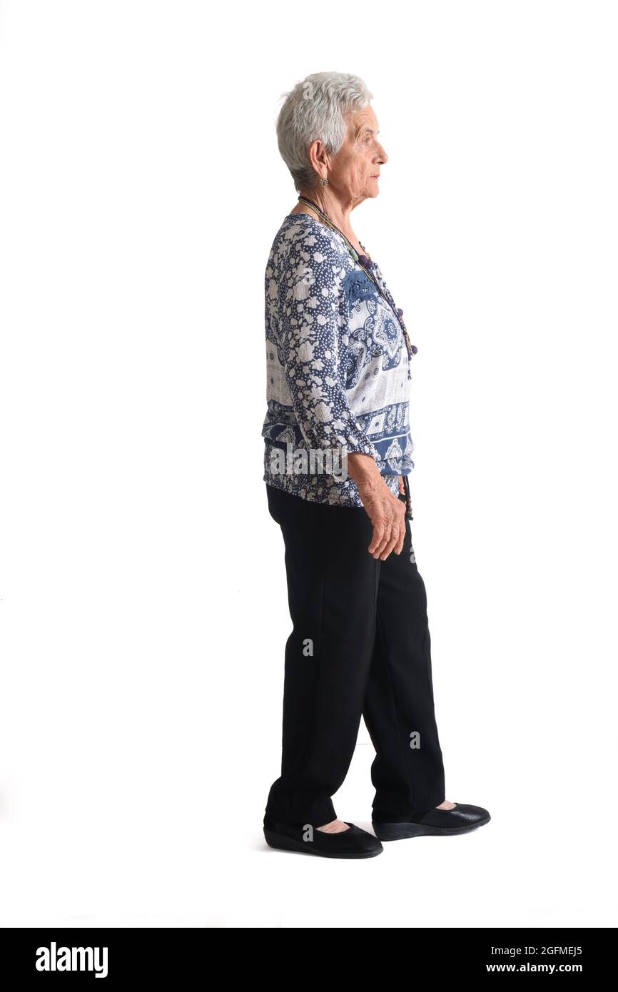 old woman walking side view