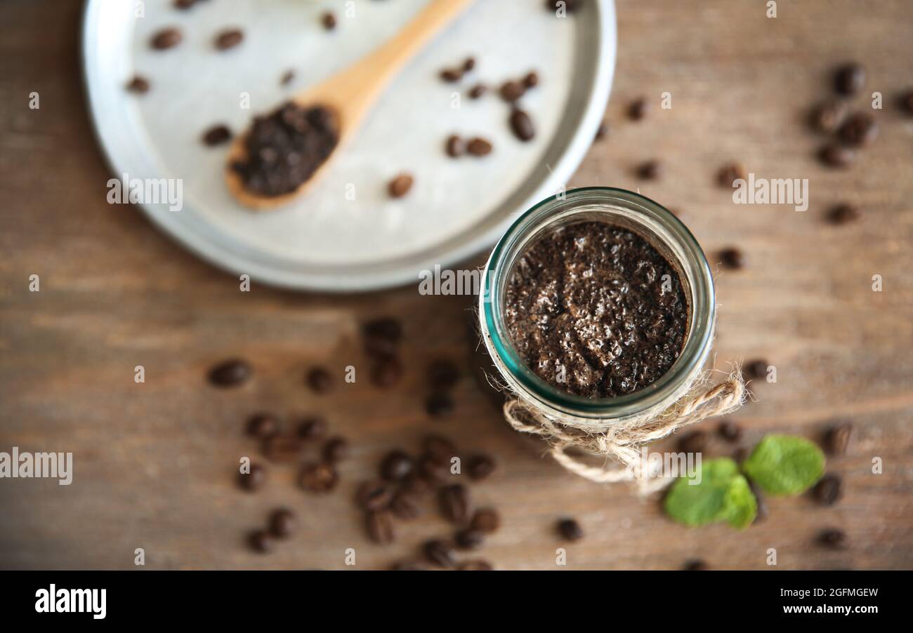Coffee body scrub in glass jar Stock Photo Alamy