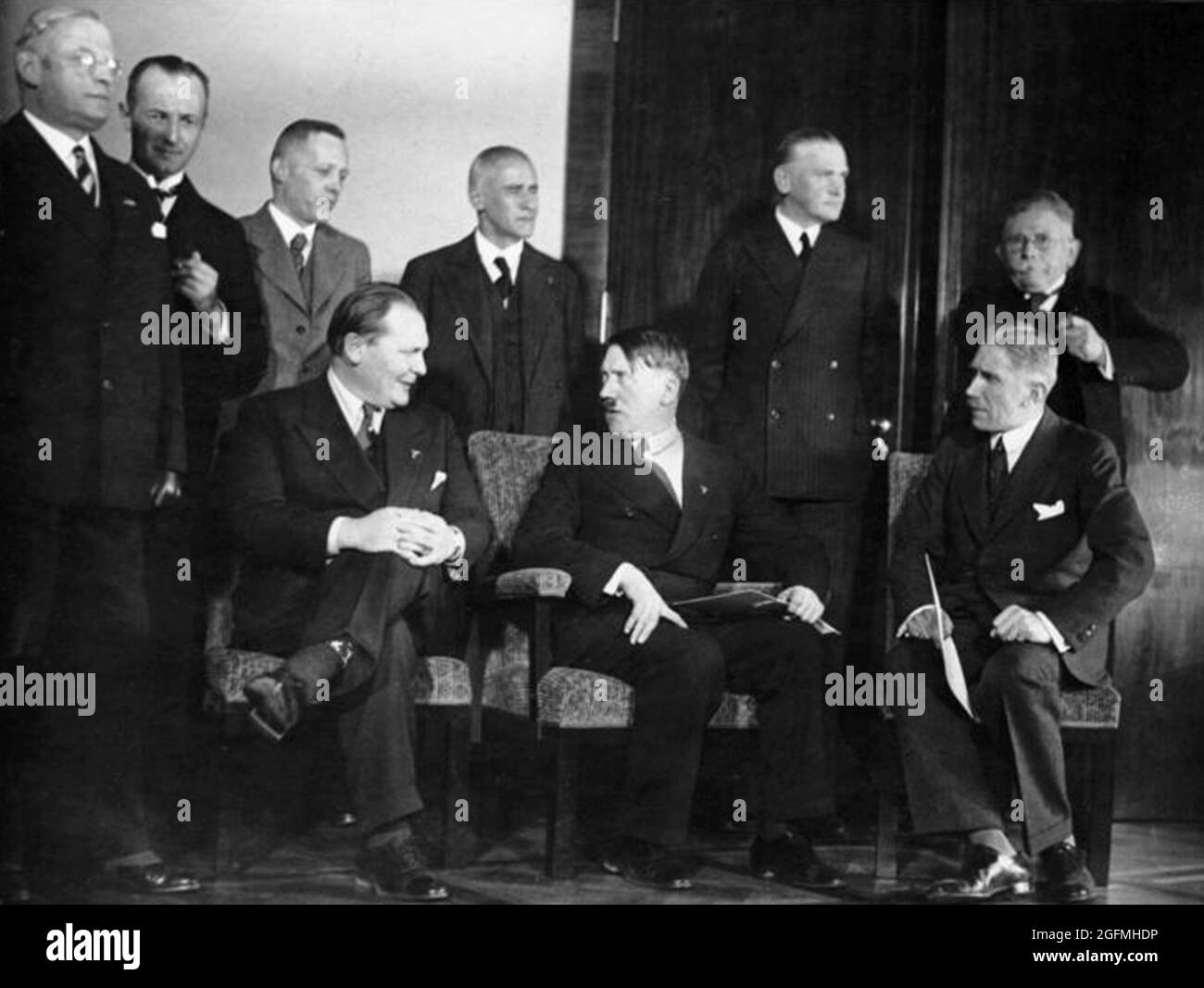 The first cabinet under Adolf Hitler after being given power on 30 January 1933. Sitting (L-R): Hermann Göring, Reich Commissioner for Aviation and the Prussian Ministry of the Interior, Adolf Hitler, Reich Chancellor, Franz von Papen, Vice Chancellor Standing (L-R) : Franz Seldte, Minister of Labour, Dr. Dr. Günther Gereke, Lutz Graf Schwerin von Krosigk, Reich Minister of Finance, Wilhelm Frick, Reich Minister of the Interior, Werner von Blomberg, Reich Minister of Armed Forces, Alfred Hugenberg, Minister of Economy and Food. Credit: German Bundesarchiv Stock Photo