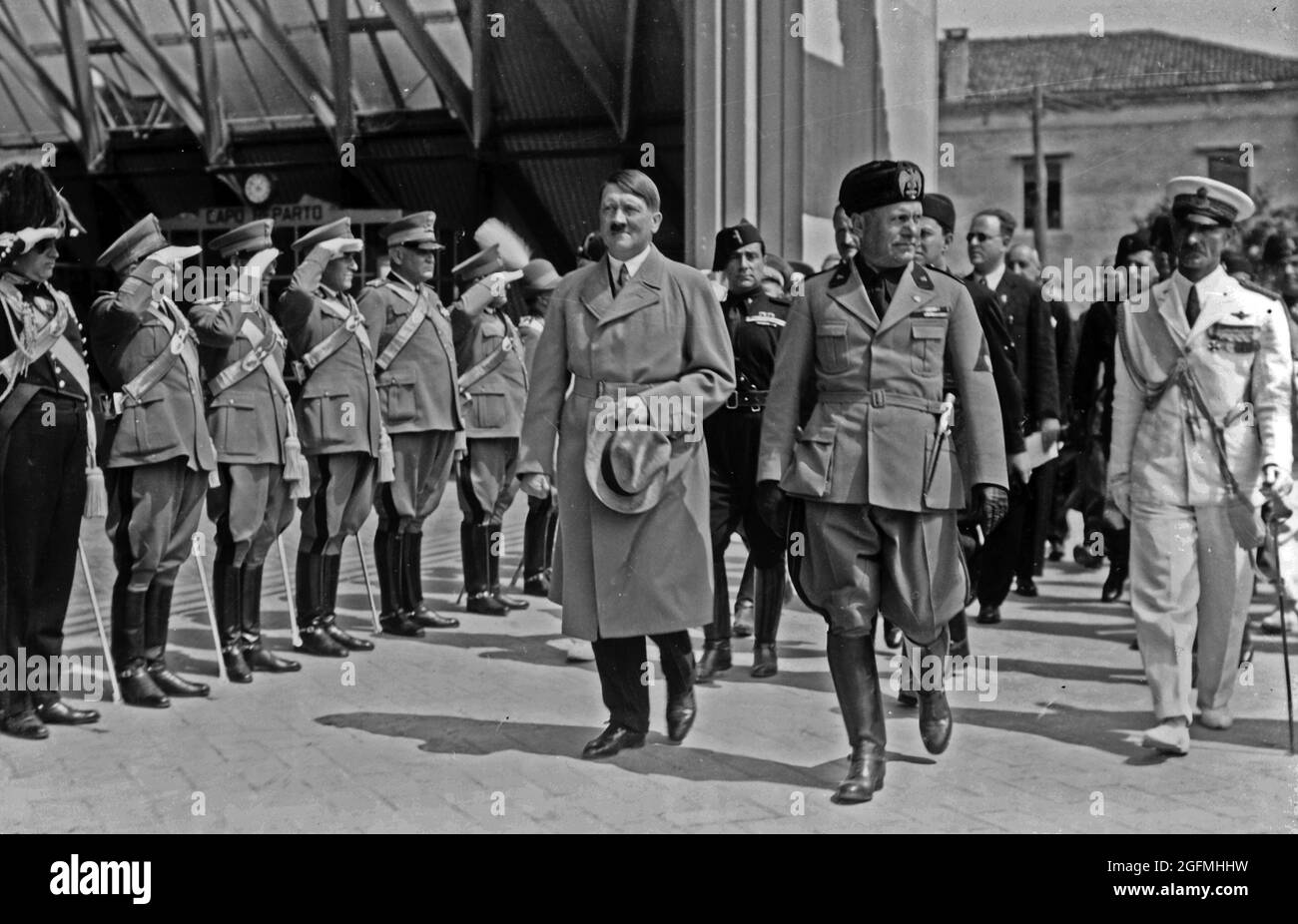 Hitler and Mussolini walking together in Italy Stock Photo