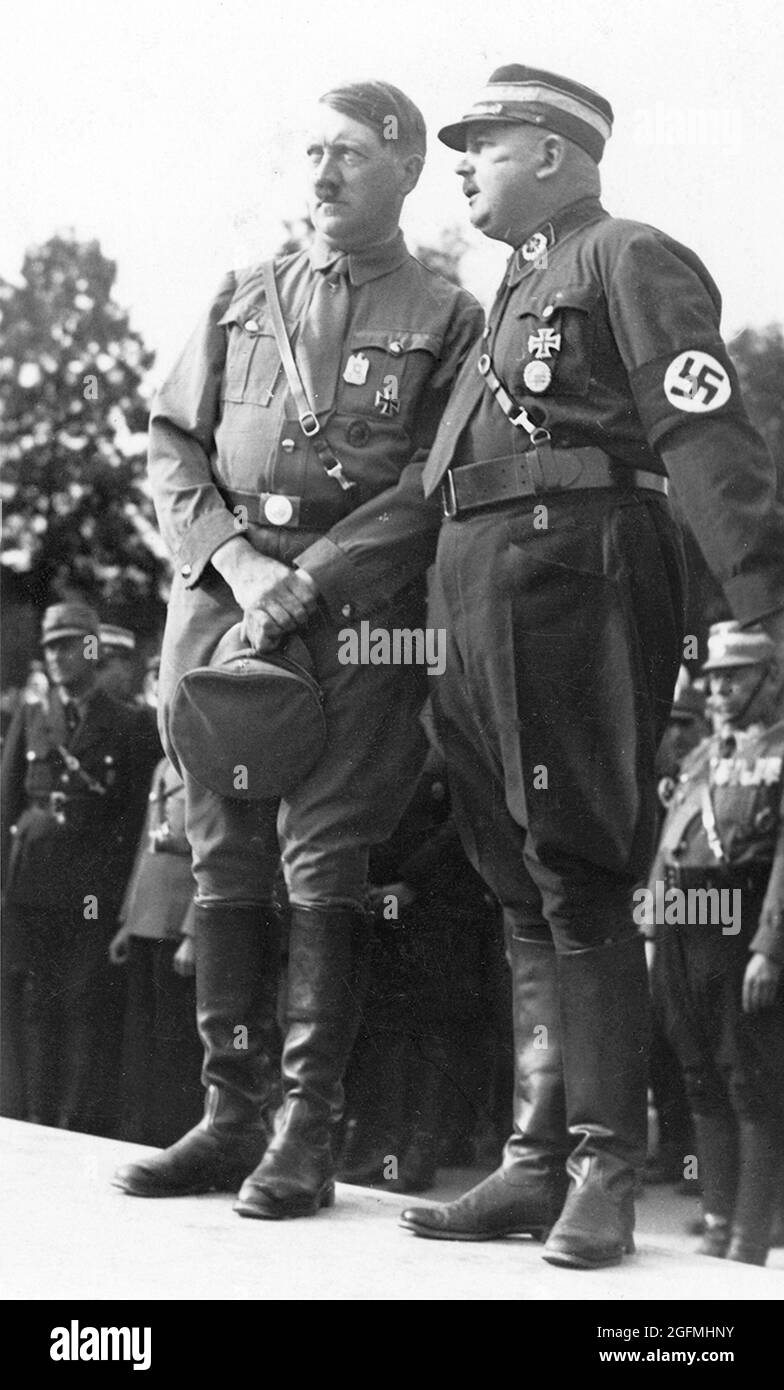 Adolf Hitler and Ernst Röhm together at Nuremberg in 1933. Credit: German Bundesarchiv Stock Photo