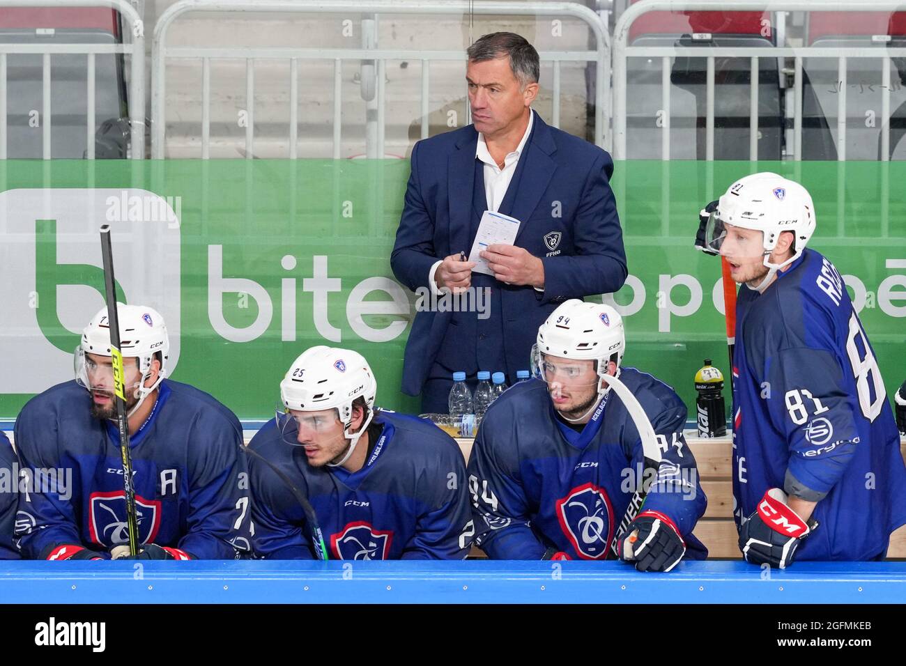 Riga, Arena Riga, Olympic Qualification, France. 26th Aug, 2021. Hungary,  head coach Philippe Bozon (France) is looking the game. Left to right: #77  Sacha Treille (France), #25 Nicolas Ritz (France), #94 Tim