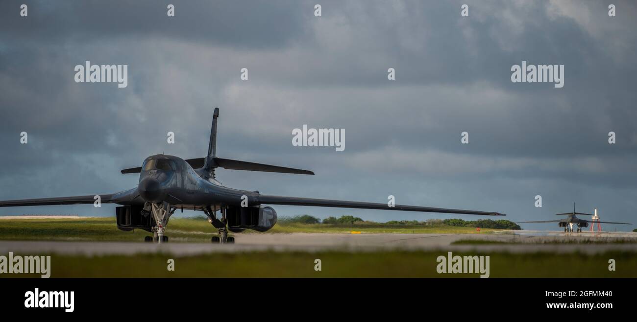 Two 9th Expeditionary Bomb Squadron B-1B Lancers taxi after landing at Andersen Air Force Base, Guam, May 22, 2020. These B-1B aircrews just completed a 24-hour mission that included a large force exercise. The 9th EBS is deployed to Andersen Air Force Base, Guam, as part of a Bomber Task Force supporting Pacific Air Forces’ strategic deterrence missions and  commitment to the security and stability of the Indo-Pacific region. (U.S. Air Force photo by Senior Airman River Bruce) Stock Photo