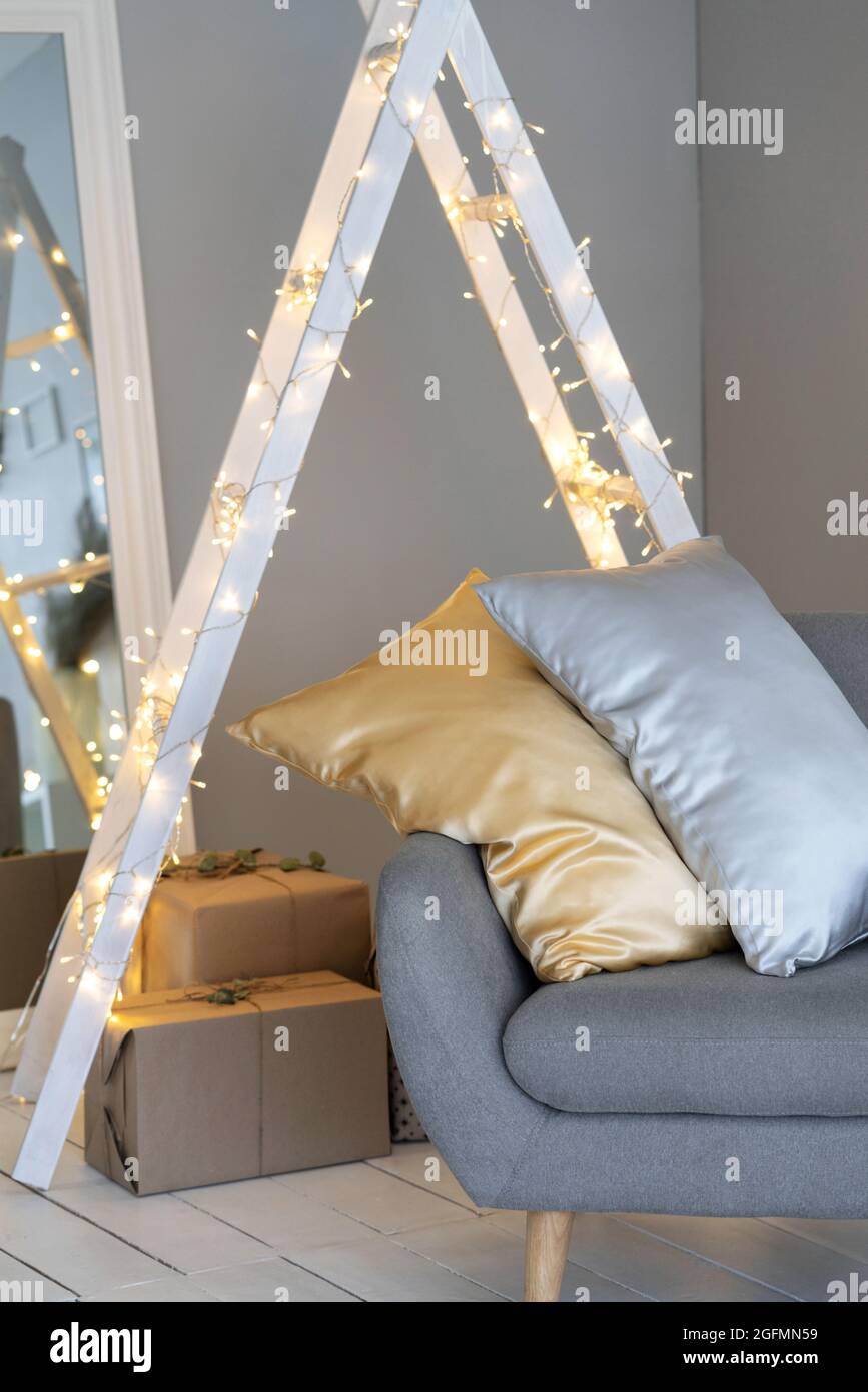 Details of a Scandinavian cozy interior in warm light beige. Stock Photo